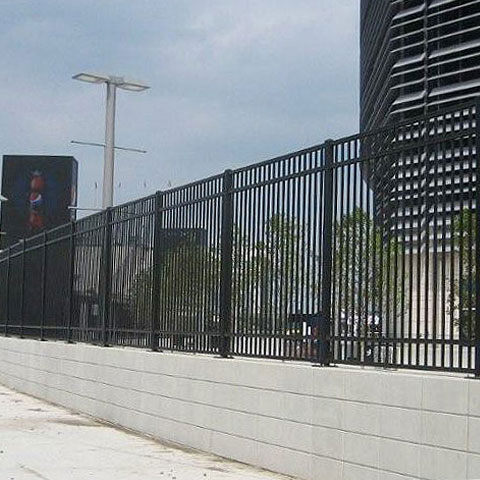 Steel fencing around a commercial building perimeter