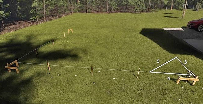 marking a new fence in the back yard