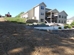 Pool area before 54-inch matte bronze aluminum pool fence installation in Barnhart, MO (view 1 of 6)