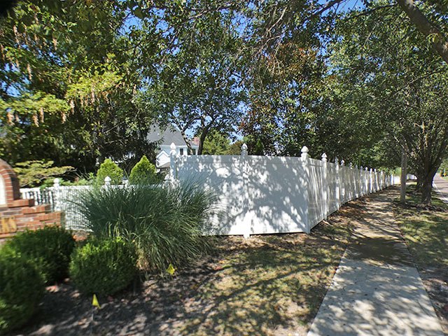 White vinyl privacy fence installed for the Bryant job in Wildwood, MO
